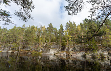 The small Skøyenputten lake in Østmarka near Oslo, early fall
