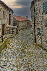 Narrow and shadowed street, Linhares de Beira, Historic village around the Serra da Estrela, Castelo Branco district, Beira, Portugal