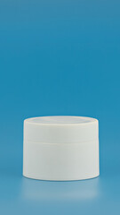 Skincare and cosmetology vertical mockup. Unbranded plastic jar for cosmetics products. Branding identity template for text and design