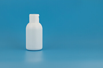 Unbranded white plastic flacon for cosmetics products. Skincare and cosmetology mockup with copy space. Branding identity template for text and design