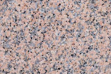 Detail of pink pulished granite texture bakground