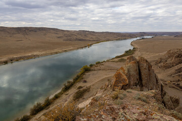 The part of the Ili River that situated in Southeastern Kazakhstan. Gorge Tamgaly, Almaty Region in Kazakhstan.