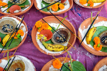 Soil malasa with supari or betel nut, banana, pan pata or betel Leaf, incense sticks, flowers, sand...