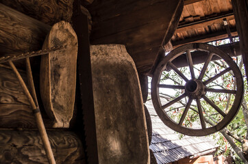 Wooden wheel, trough, bathtub and rake. Vintage products.