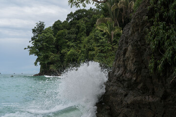 Waves crashing on the cliff