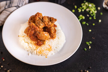 rice curry meat vegetable chicken spice tomato sauce meal snack on the table copy space food background rustic keto or paleo diet