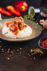 rice curry meat vegetable chicken spice tomato sauce meal snack on the table copy space food background rustic keto or paleo diet