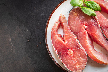 carp fish slice raw white headless freshwater fish seafood meal snack on the table copy space food...