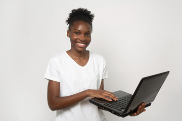african cheerful manager with laptop on white background 