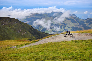 Mountain biker in mountains landscape