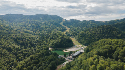 Fototapeta premium Aerial view of Hodrusske lake in Hodrusa-Hamre village in Slovakia