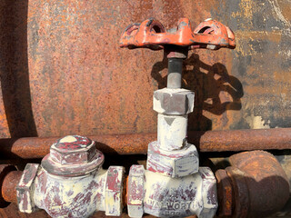 Rusty Nuts and Spigot