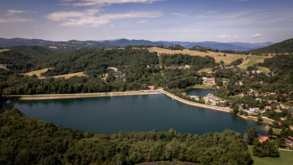 Fototapeta na wymiar Aerial view of Vindsachtske lake in the village of Stiavnicke Bane in Slovakia