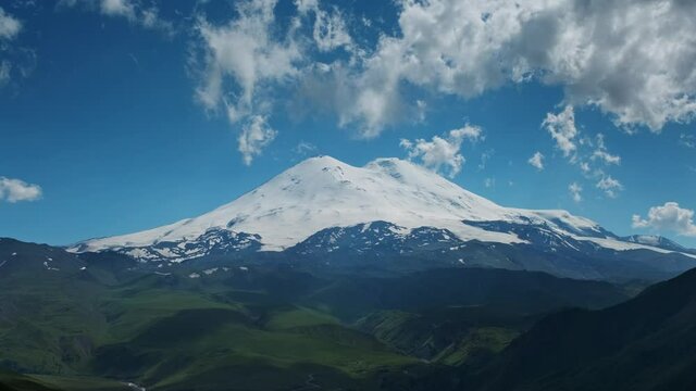 Beautiful view of Mount Elbrus and clouds, North Caucasus mountains, Russia, timelapse 4k
