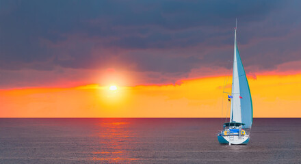 Sailing Yacht from sail regatta on mediterranean sea at sunset - Sailing luxury yacht with white sails in the Sea. - obrazy, fototapety, plakaty