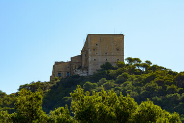 Fototapeta premium hermitage on the top of a hill above a Mediterranean forest