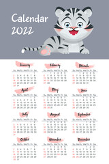 Vertical Calendar 2022 for United States with tiger illustration, symbol year. Calendar grid in English