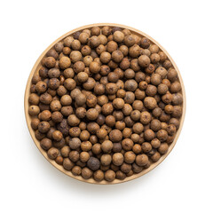 Isolated wooden dish with allspice on white background