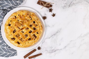 apple pie and spices cinnamon and star anise. Copy space, top view