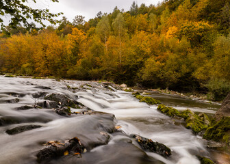 River cascades in autumn PL
