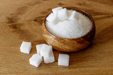 sugar cubes on a wooden table