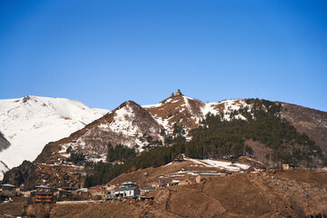 Gergeti Orthodox Church of the Holy Trinity in the mountains of Georgia. An authentic spiritual place