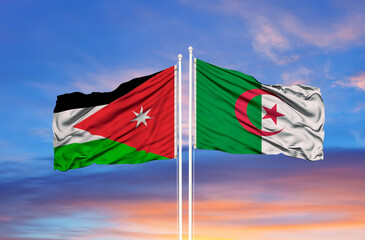 Algeria and Jordan two flags on flagpoles and blue sky