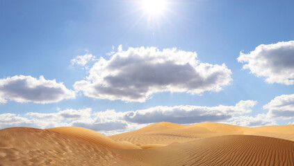 Fototapeta na wymiar Picturesque view of sandy desert and blue sky on hot sunny day