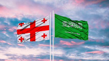 Georgia and Saudi Arabia two flags on flagpoles and blue sky
