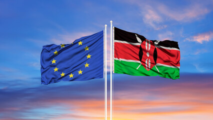 European Union and Kenya two flags on flagpoles and blue cloudy sky