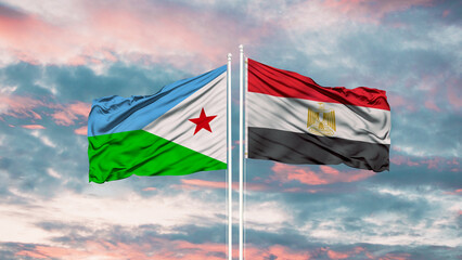 Egypt and Djibouti two flags on flagpoles and blue cloudy sky