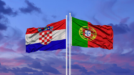 Portugal and Croatia two flags on flagpoles and blue sky