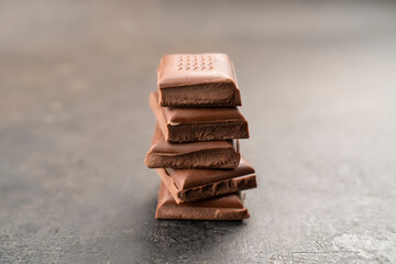 Chocolatier preparing chocolate tower pieces chocolates. recipe Cooking handmade chocolate bar, dessert, candies