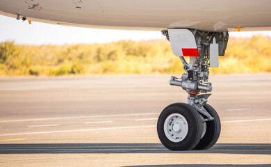The plane is preparing to fly at the airport. Airplane on the runway at the airport. The turbine of...