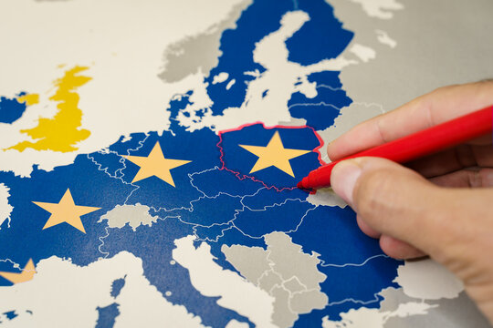 Fototapeta Hand drawing a red line between Poland and the rest of EU, Polexit concept.
