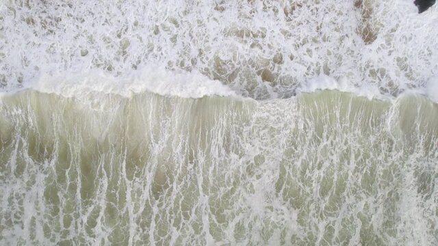 White Water Created By Waves Crashing on to the Beach