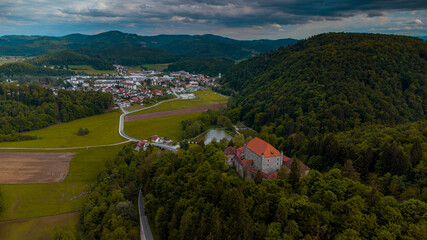Panoramic aerial drone view of castle of Mirna on a summer day. Picturesque castle in dolenjska region of Slovenia