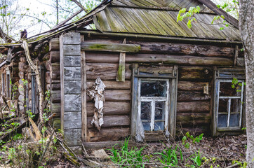 Abandoned old wooden house in a Russian village (hut, shack)