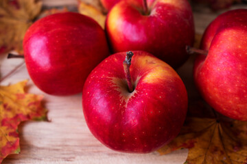 red apples on wooden table