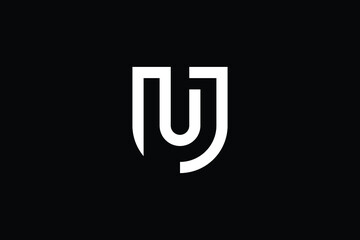 UN logo letter design on luxury background. NU  logo monogram initials letter concept. UN icon logo design. NU elegant and Professional letter icon design on black background. U N NU UN - obrazy, fototapety, plakaty