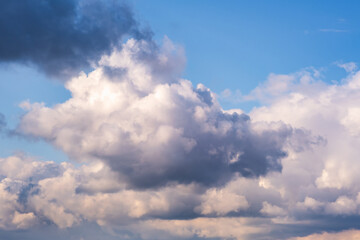 Blue sky background with big white striped clouds. blue sky panorama may use for sky replacement
