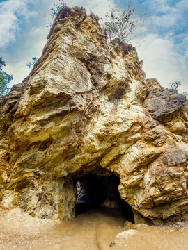Rock with tunnel heading to Yellow Lake - Zolte Jezioro in Colored Lakes - Kolorowe Jeziorka in Poland in Summer