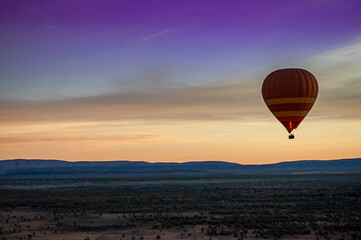 Hot air balloon over the Australian outback near Alice Springs, Northern Territory.