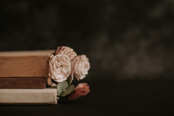 three old books and dried flowers - obrazy, fototapety, plakaty