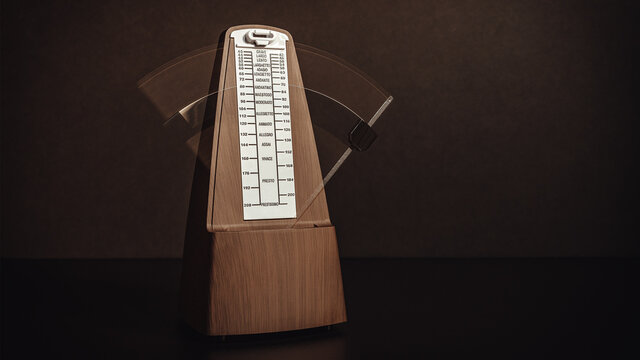Metronome in Motion with Blur for Music Wallpaper Background