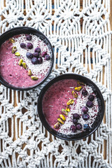 vegan acai blueberries coconut smoothie bowl, healthy plant-based food