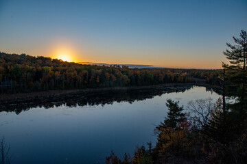 Fototapeta na wymiar Autumn sunset over a lake