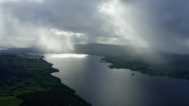 Lough Derg, County Tipperary, Ireland, September 2021. Drone gradually descends while tracking east, parallel with Carrowgar Bay looking south towards Ballina and Killaloe.