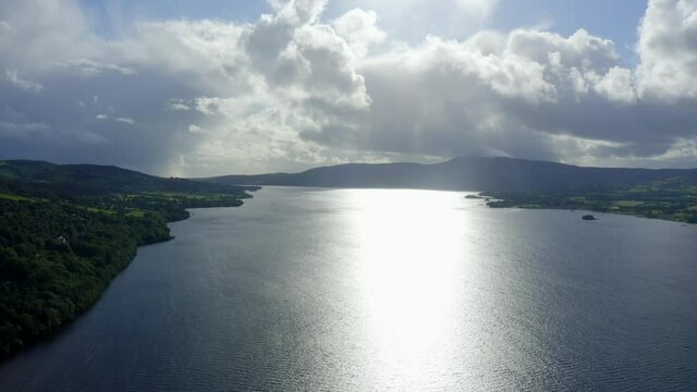 Lough Derg, County Tipperary, Ireland, September 2021. Drone gradually ascends while tracking west from Nenagh across Carrowgar Bay while looking south towards Ballina and Killaloe.