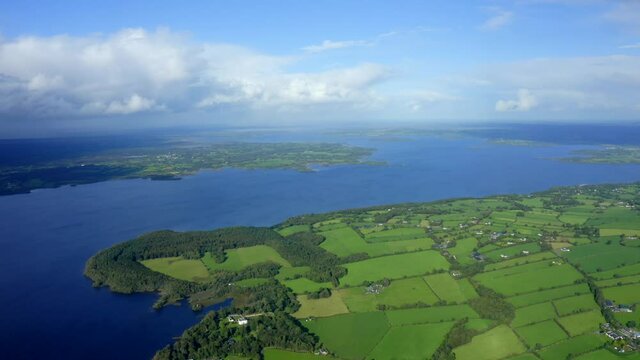 Lough Derg, County Tipperary, Ireland, September 2021. Drone gradually descends while pulling south over Nenagh parallel with Carrowgar Bay while looking north towards the lake and the river Shannon.